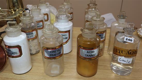 A collection of fourteen late Victorian chemists dry powder drug jars and stoppers, with gilt framed named labels, height 19cm